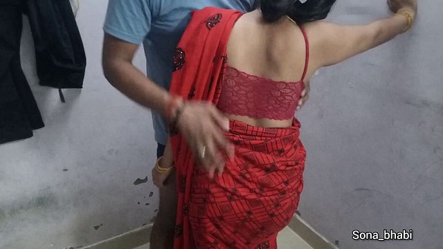 Indian Desi Bhabhi Gets Naughty in a Red Saree with Hot Bedroom Action